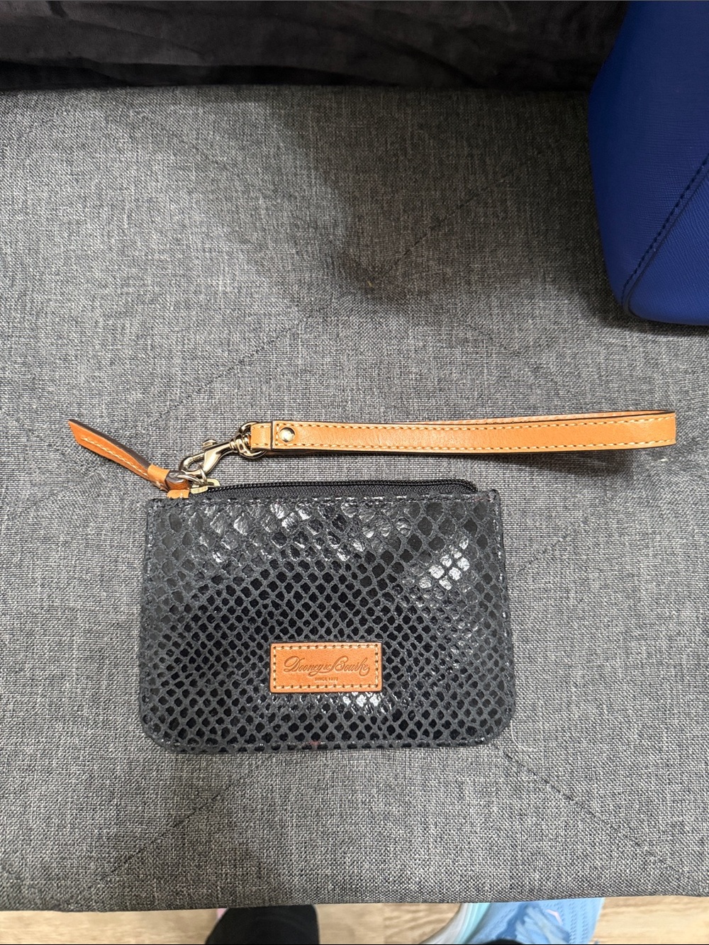 Dooney & Bourke Black Snake-Embossed Wristlet with Tan Trim